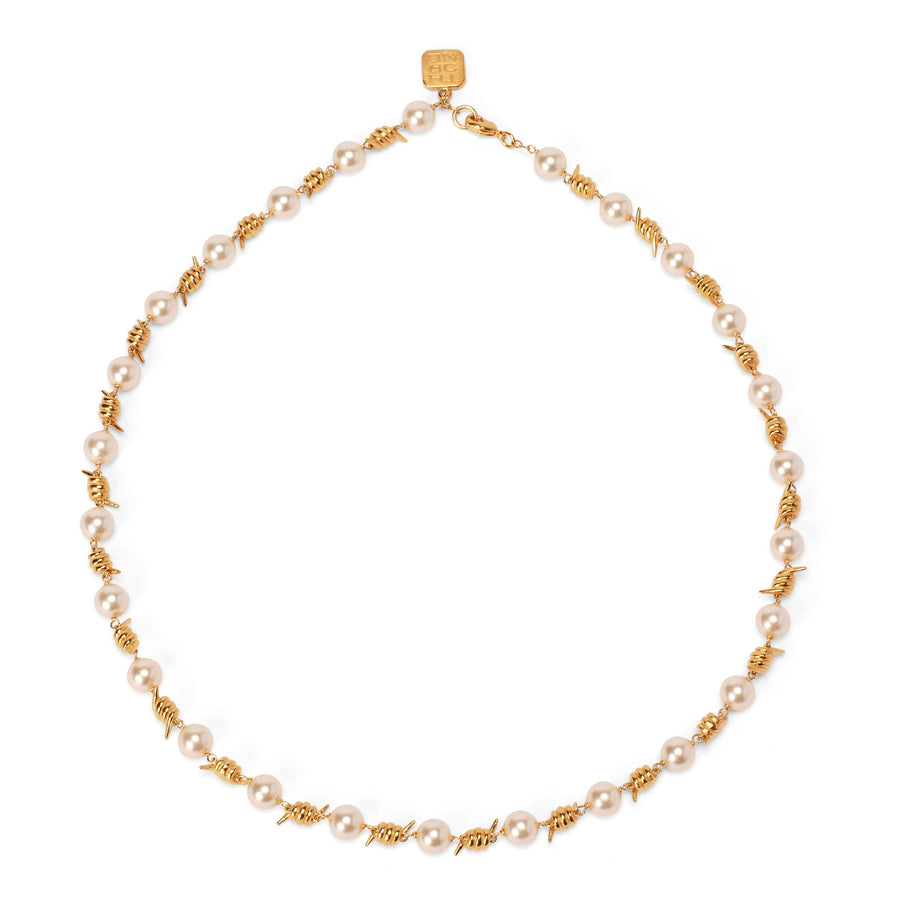 Forbidden Truths Necklace, an opulent white crystal pearl and hand-wrapped barbed wire necklace dipped in 14k gold.