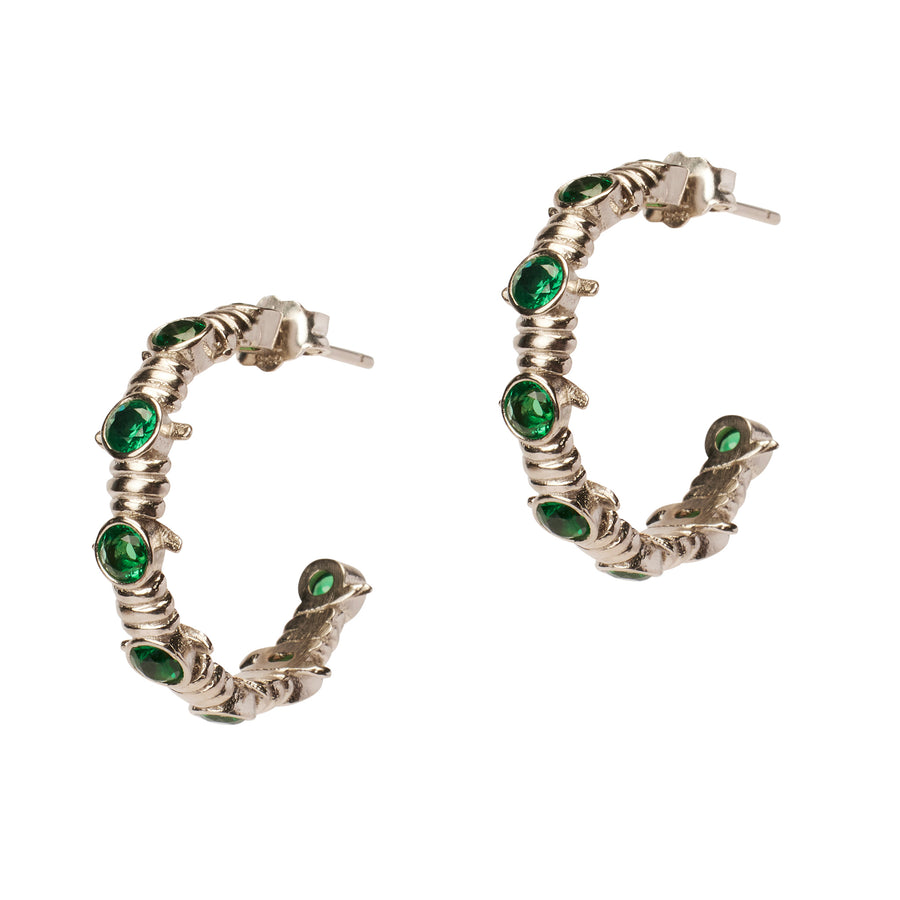 Caught Up Earrings by Thorne Dynasty in silver with emerald details.