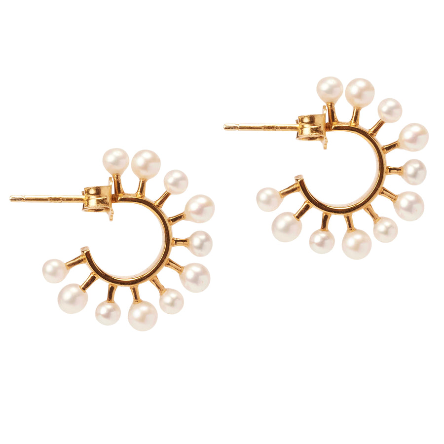 Pearl studded hoop gold earrings.